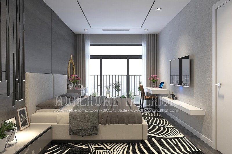 Giường ngủ hiện đại có lối thiết kế đơn giản được bố trí ở giữa phòng ngủ, tạo nên một điểm nhấn không quá đơn điệu.